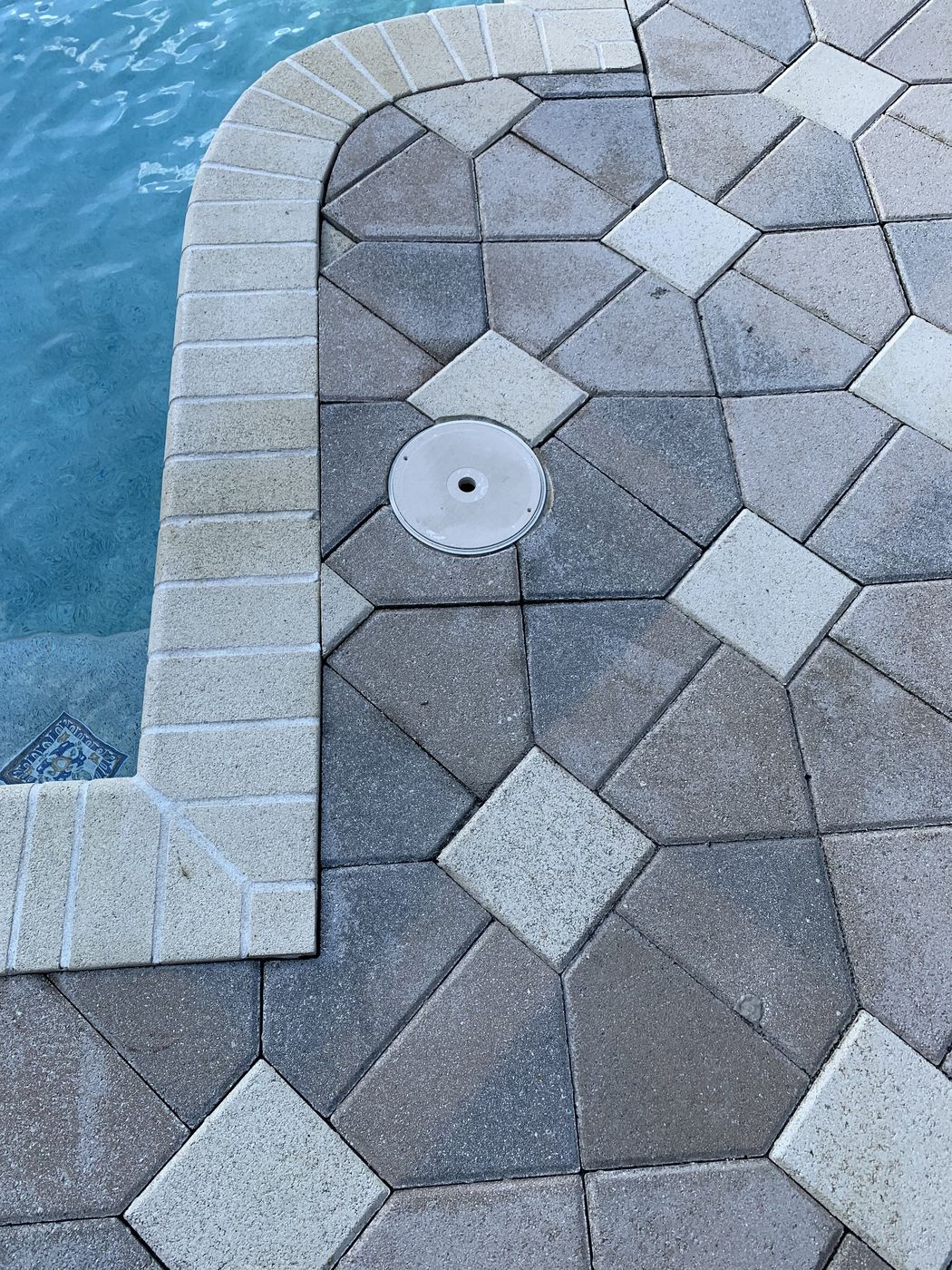 Pool deck pavers with coping